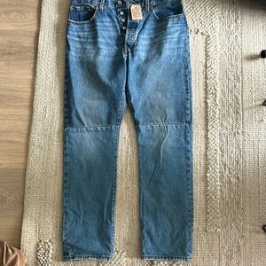 Levi’s new with tags. Button fly. Split colour.